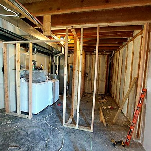 Basement framing running around the mechanical equipment.
