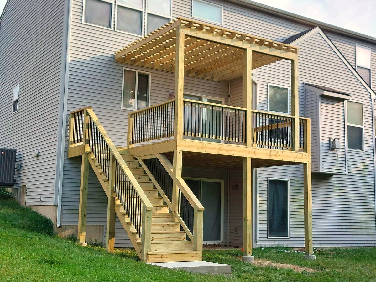 Covered deck with a timber pergola over the upper level.